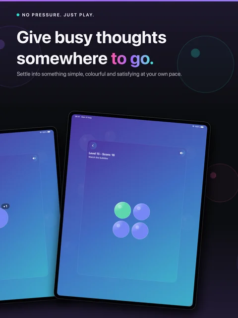 Colourful bubble gameplay with level and score indicators on iPad